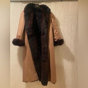 Authentic possum coat that is reversible to nylon rain silk